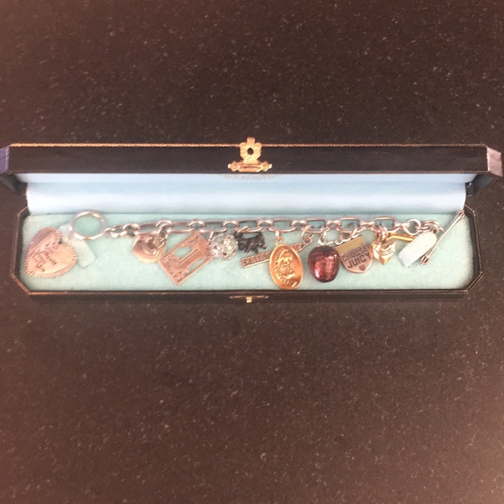 Juicy Couture charm bracelet/ with extra charm
